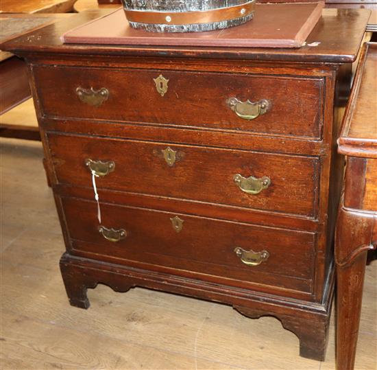 A small George I style oak three drawer chest W.77cm
